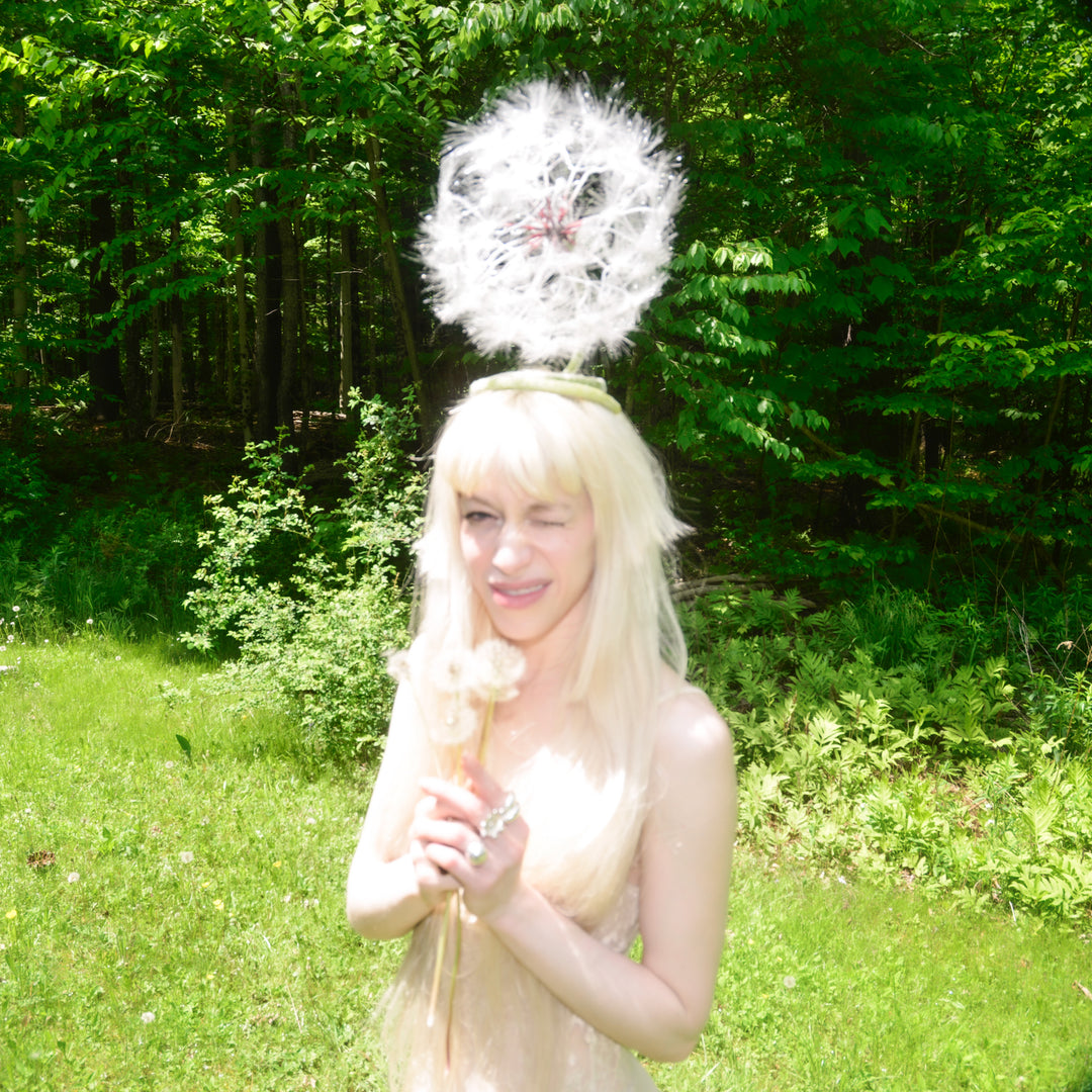 Online Dandelion fascinator hats. large hair clip